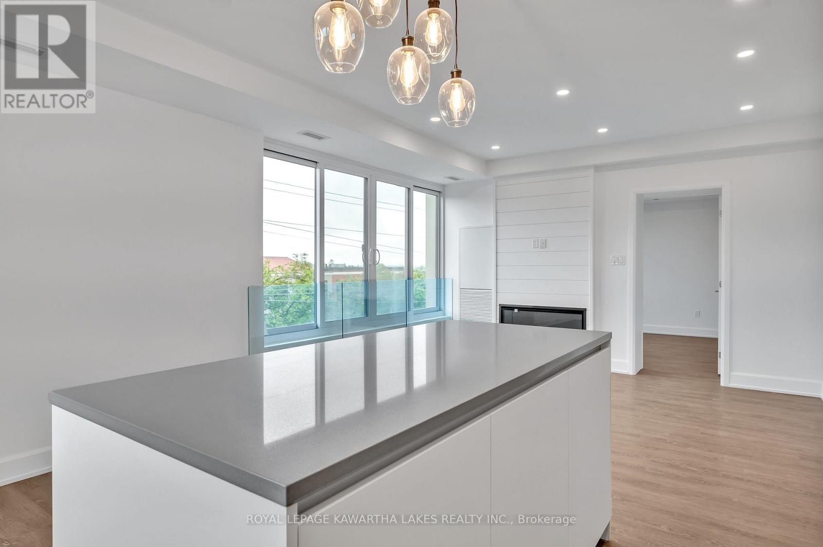 404 - 195 Hunter Street E, Peterborough (ashburnham Ward 4), Ontario