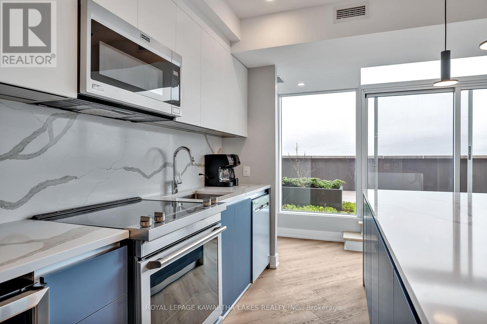 404 - 195 Hunter Street E, Peterborough (ashburnham Ward 4), Ontario